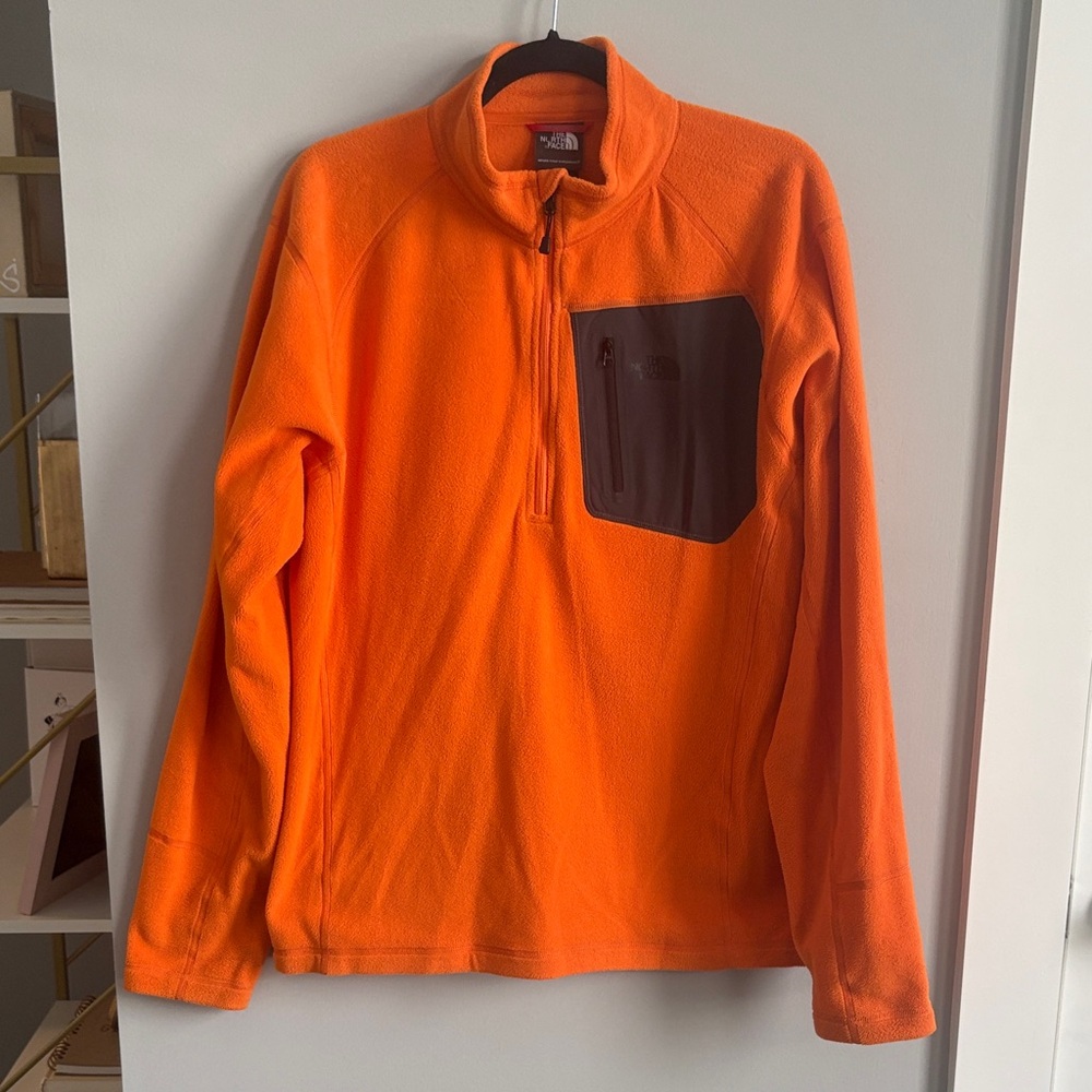 The North Face Vibrant Orange Fleece with Black Pocket